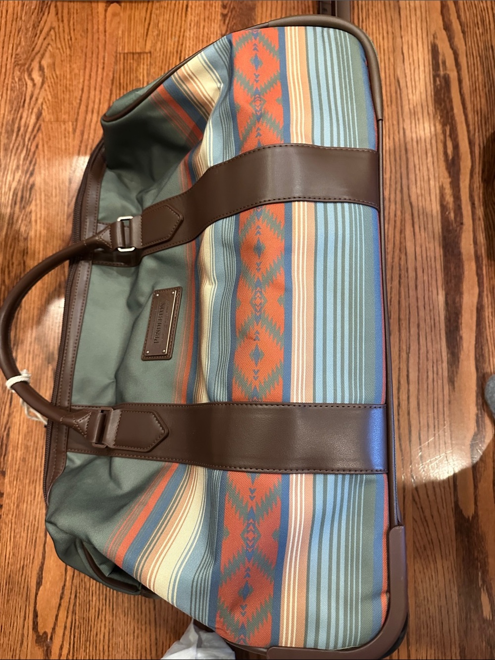 Pendleton rolling duffle Travel Bag - Brown Leather Trim . Beautiful stripes.